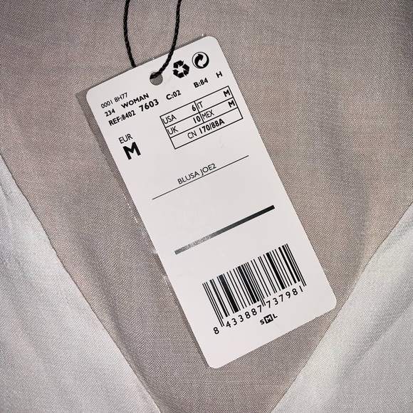 Mango Buttoned flowy blouse - Picture 8 of 9